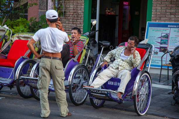 The Old Quarter, The Hanoi Street, rickshaw in the streets of Vietnam Hanoi, Vietnam - june 11, 2019: The Old Quarter, The Hanoi Street, rickshaw in the streets of Vietnam vietnamese man taxi motorbike driver stock pictures, royalty-free photos & images