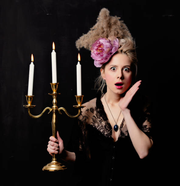 beautiful blonde countess with a candlestick - baroness imagens e fotografias de stock