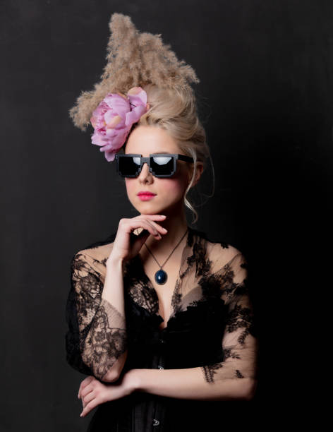istock Beautiful blonde countess in sunglasses 1202826662