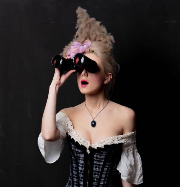 beautiful blonde countess with binoculars - baroness imagens e fotografias de stock