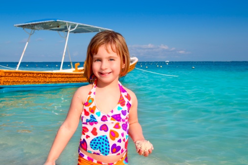 blond  little girl in Caribbean beach  vacation