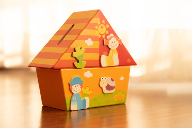 istock Wooden piggy bank 1202835481