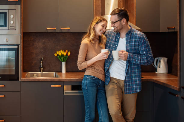 istock Couple enjoying in coffee at home 1202835609