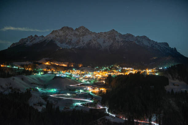 istock mountain village at night illuminated 1202837279