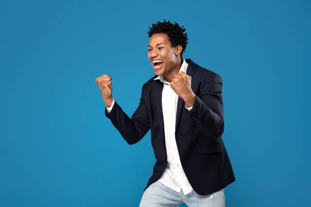 istock Succesful african bussinessman smiling. 1202849078