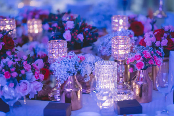 istock Tables set for an event party or wedding reception. luxury elegant table setting dinner in a restaurant. glasses and dishes 1202850096