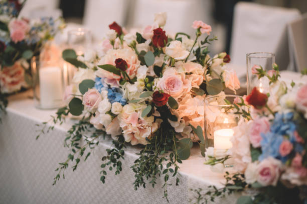 Tables set for an event party or wedding reception. luxury elegant table setting dinner in a restaurant. glasses and dishes