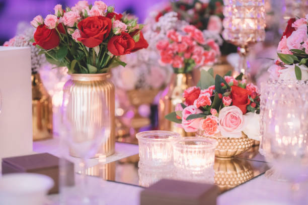 istock Tables set for an event party or wedding reception. luxury elegant table setting dinner in a restaurant. glasses and dishes 1202850107