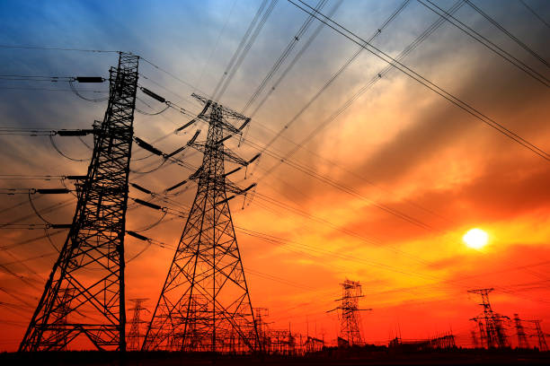 istock Electric tower, silhouette at sunset 1202851299
