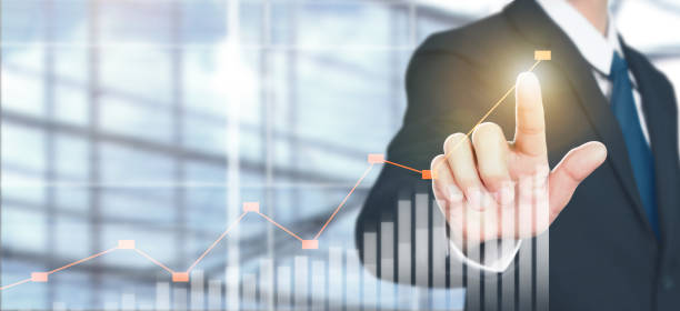 istock Businessman plan graph growth and increase of chart positive indicators 1202854257