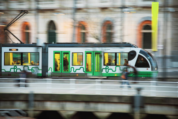 Modern tram in motion A modern tram in motion in Bilbao, Spain blurred motion street car green stock pictures, royalty-free photos & images