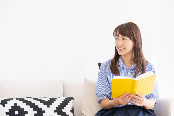 istock asian woman who reads a book 1202856002
