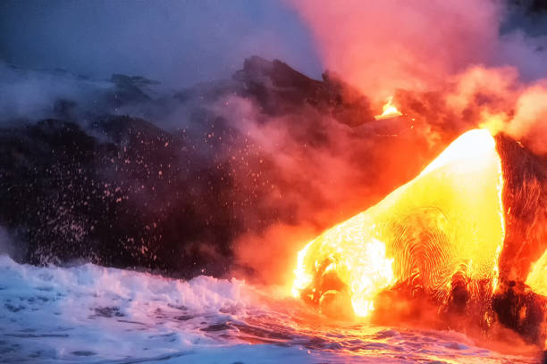 istock Molten lava flowing into the ocean 1202860313