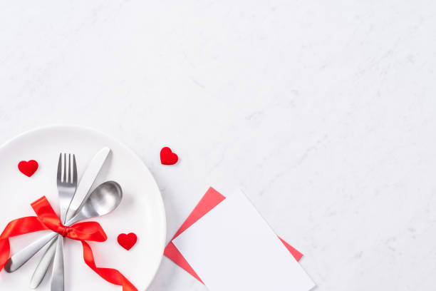 istock Valentine's Day meal design concept - Romantic plate dish set isolated on marble white background. 1202862511