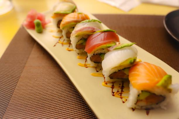 istock Maki sushi which is roll sushi by Japanese Sushi chef 1202862829