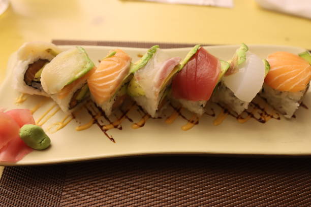 istock Maki sushi which is roll sushi by Japanese Sushi chef 1202862838