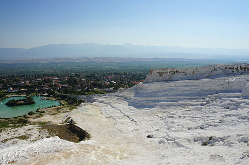 Panoramic view of the beautiful white Travertines terrace of Pamukkale landscape without water in July