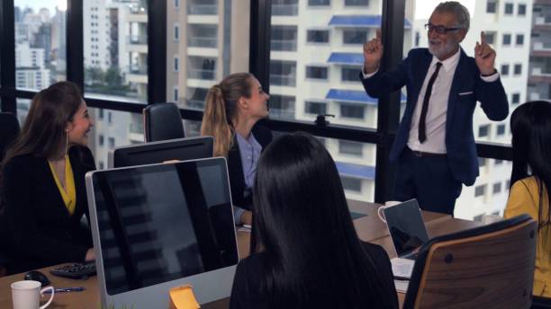 istock Senior leader giving advice speech to team members 1202870330