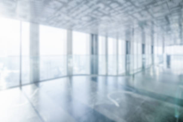 istock Blur background of empty office interior in city. 1202870657
