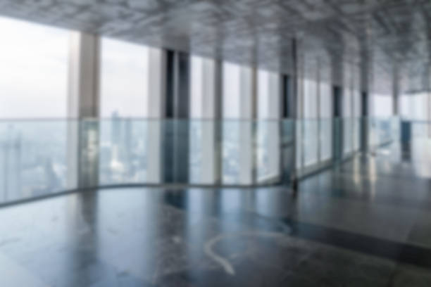 istock Blur background of empty office interior in city. 1202871281