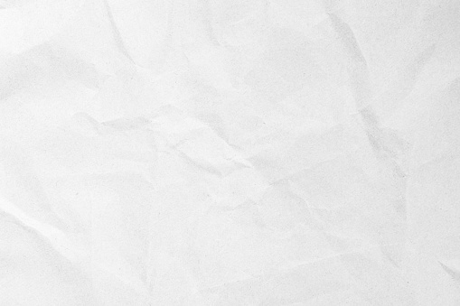 Textura de papel artesanal reciclado blanco como fondo. Textura de papel gris, antigua página vintage o viñeta grunge del periódico antiguo. Patrón de arte áspero arrugado letra grunge. Armario con espacio de copia para texto. photo