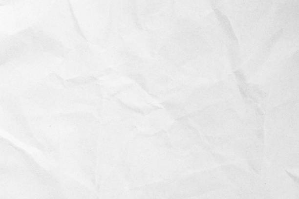 白いリサイクルクラフト紙のテクスチャを背景に。グレーの紙の質感、古いヴィンテージページや古い新聞のグランジビネット。パターンラフアート折り目グランジ文字。テキスト用のコピ� - construction paper ストックフォトと画像