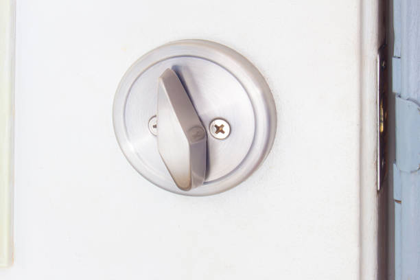 istock Open round pocket door lock on a white door 1202875231