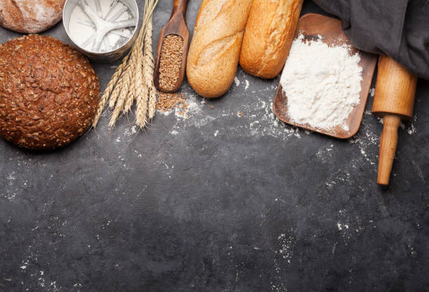 istock Various bread with wheat, flour and cooking utensils 1202878836