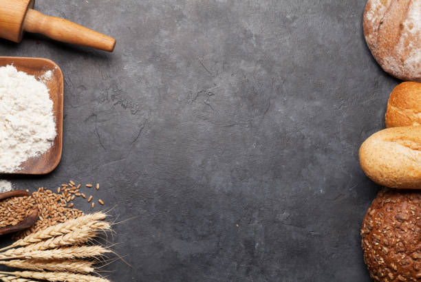 istock Various bread with wheat, flour and cooking utensils 1202878950