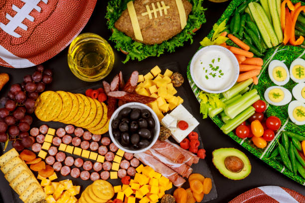 istock Party table for watching american football game. 1202879007