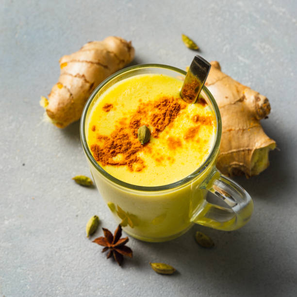 istock Turmeric golden latte on light background 1202881796