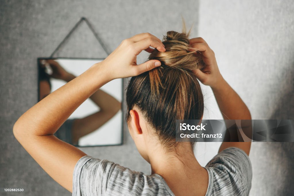Girl Doing Hairstyle At The Mirror Stock Photo - Download Image Now - Women, Hair, Hairstyle - iStock Girl Doing Hairstyle At The Mirror Stock Photo - Download Image Now - Women, Hair, Hairstyle - iStock