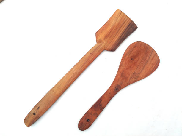 istock some wooden spatula isolated on white background 1202884188