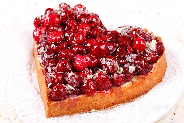 sweet cake in heart shape stock photo