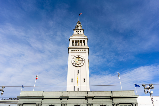 The Ferry building clock tower rising above the ferry terminal, San Francisco, California
