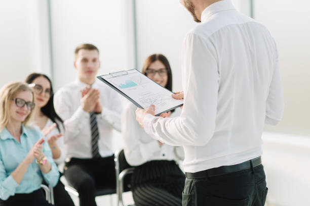 istock business team asks questions on the briefing in the office 1202896359