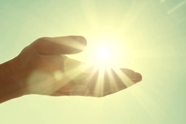 istock Sun in my hand 1202896950