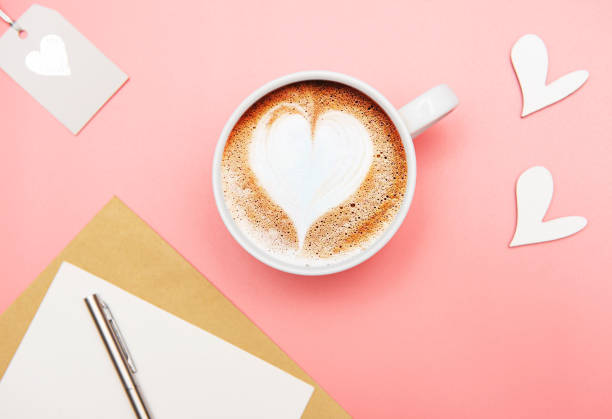 istock A cup of coffee with heart pattern 1202897578