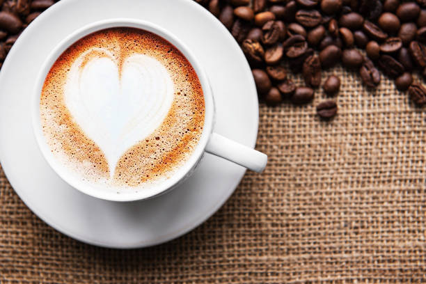 istock A cup of coffee with heart pattern 1202897599