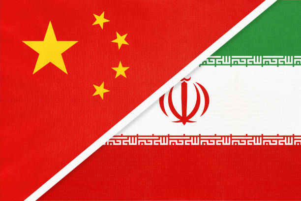 istock People's Republic of China or PRC vs national flag from textile. Relationship between two asian countries. 1202901250