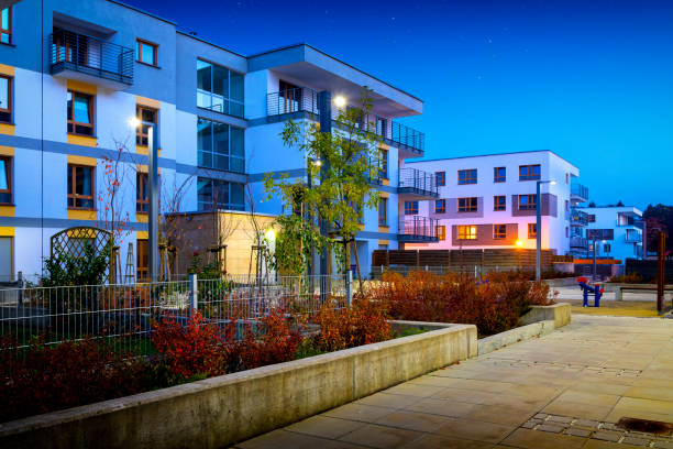 istock Modern colorful housing estate by night 1202902795