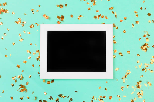 istock Golden stylish decoration on blue  background. Place for text on frame . Festive concept. 1202902912