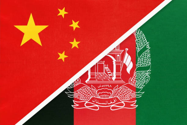 istock People's Republic of China or PRC vs Afghanistan national flag from textile. Relationship between two asian countries. 1202903073