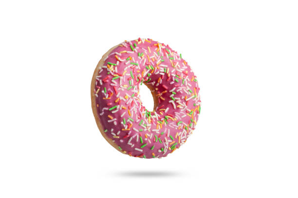 istock pink glazed donut with colored sprinkles. isolated on white background 1202905036