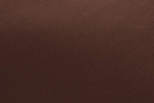 istock abstract dark brown colour paper texture background 1202905447