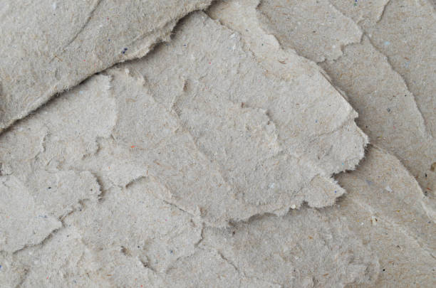 istock Creative background with scattered overlay of crumpled papers. 1202906480
