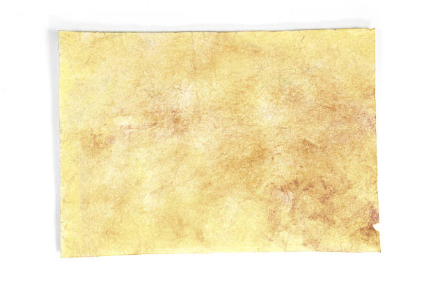 istock Vintage aged paper sheet isolated on white background. 1202907344