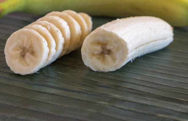 istock Banana on a green banana leaf 1202911877