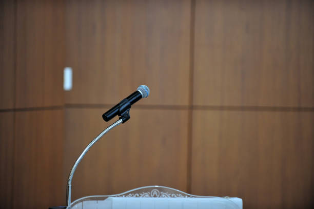istock Microphone in conference on seminar room 1202912907