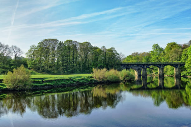 A wide view of the river Lune and bridge, near Lancaster A wide view of the river Lune and bridge at the Crokk o' Lune, near Lancaster lancaster lancashire stock pictures, royalty-free photos & images